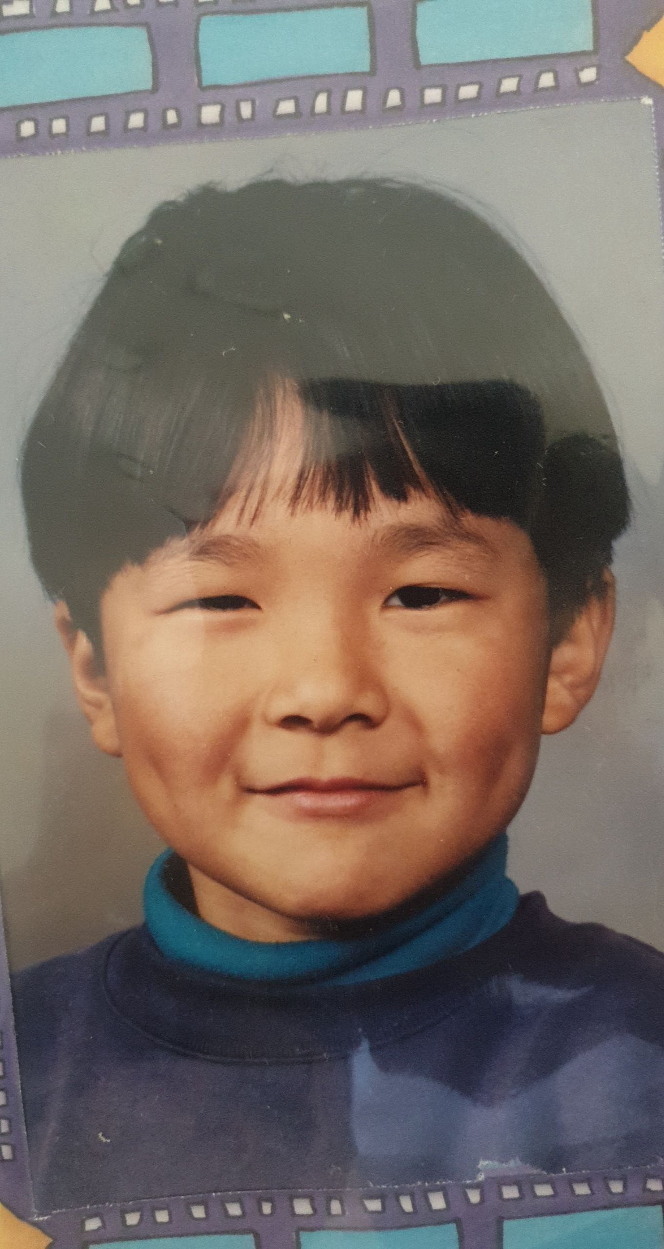 Glen as a young boy, an old school photograph